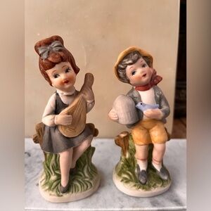 Vintage boy and a girl with musical instruments